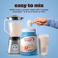 Premier Protein Whey Powder — Vanilla, 17 servings — mixing the powder